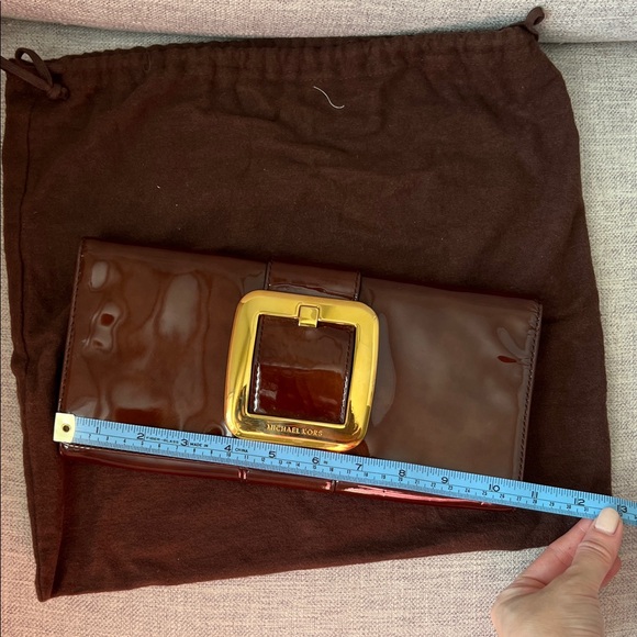 Michael Kors Glossy Brown clutch with Gold Accent - Picture 7 of 9
